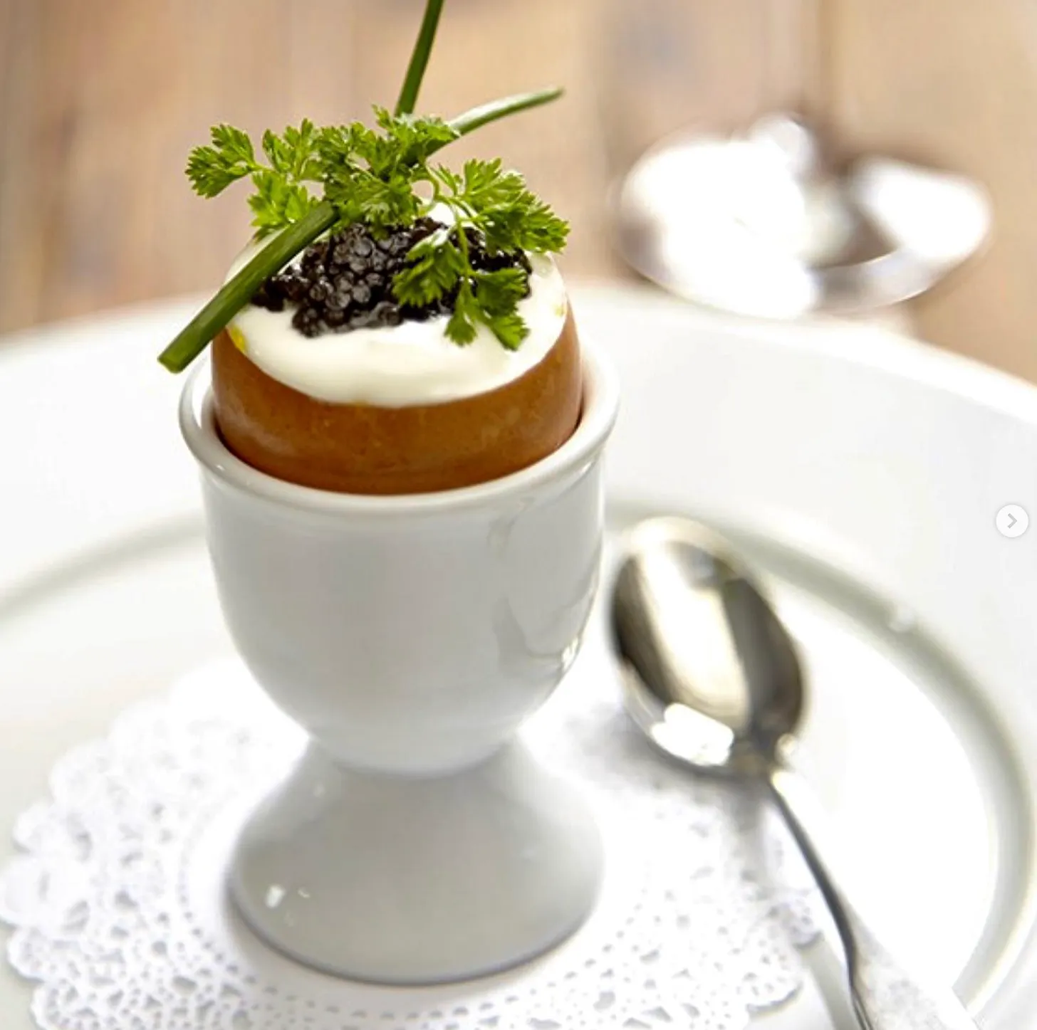 Oeuf Outhier — soft egg topped with caviar